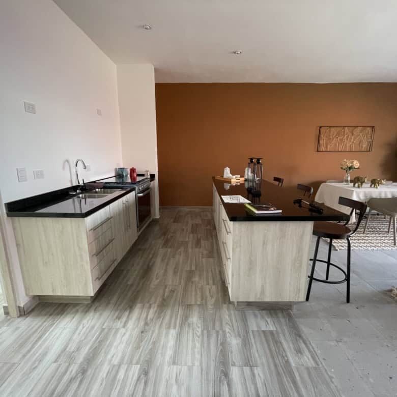 Spacious kitchen and dining area in a modern colonial-style home in La Serena, San Miguel de Allende.