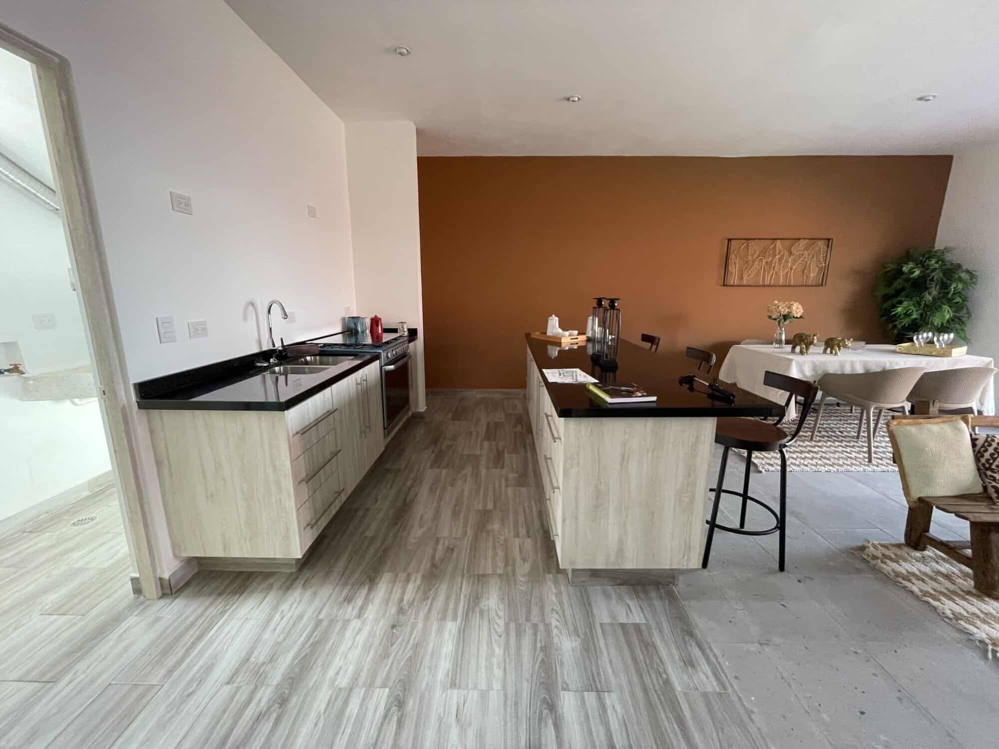 Spacious kitchen and dining area in a modern colonial-style home in La Serena, San Miguel de Allende.