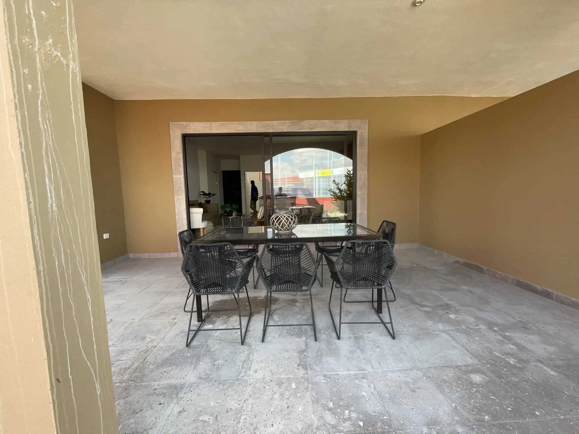 Spacious outdoor patio with dining area in a modern colonial-style home in La Serena, San Miguel de.