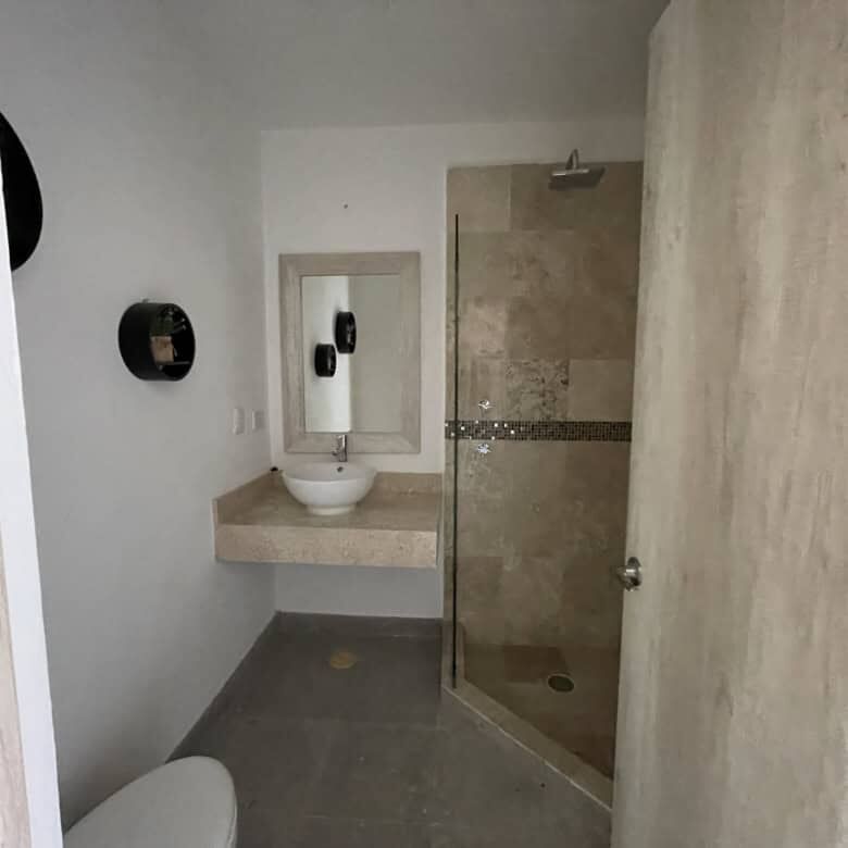 Modern colonial style bathroom with walk-in shower and minimalist design in La Serena, San Miguel de.