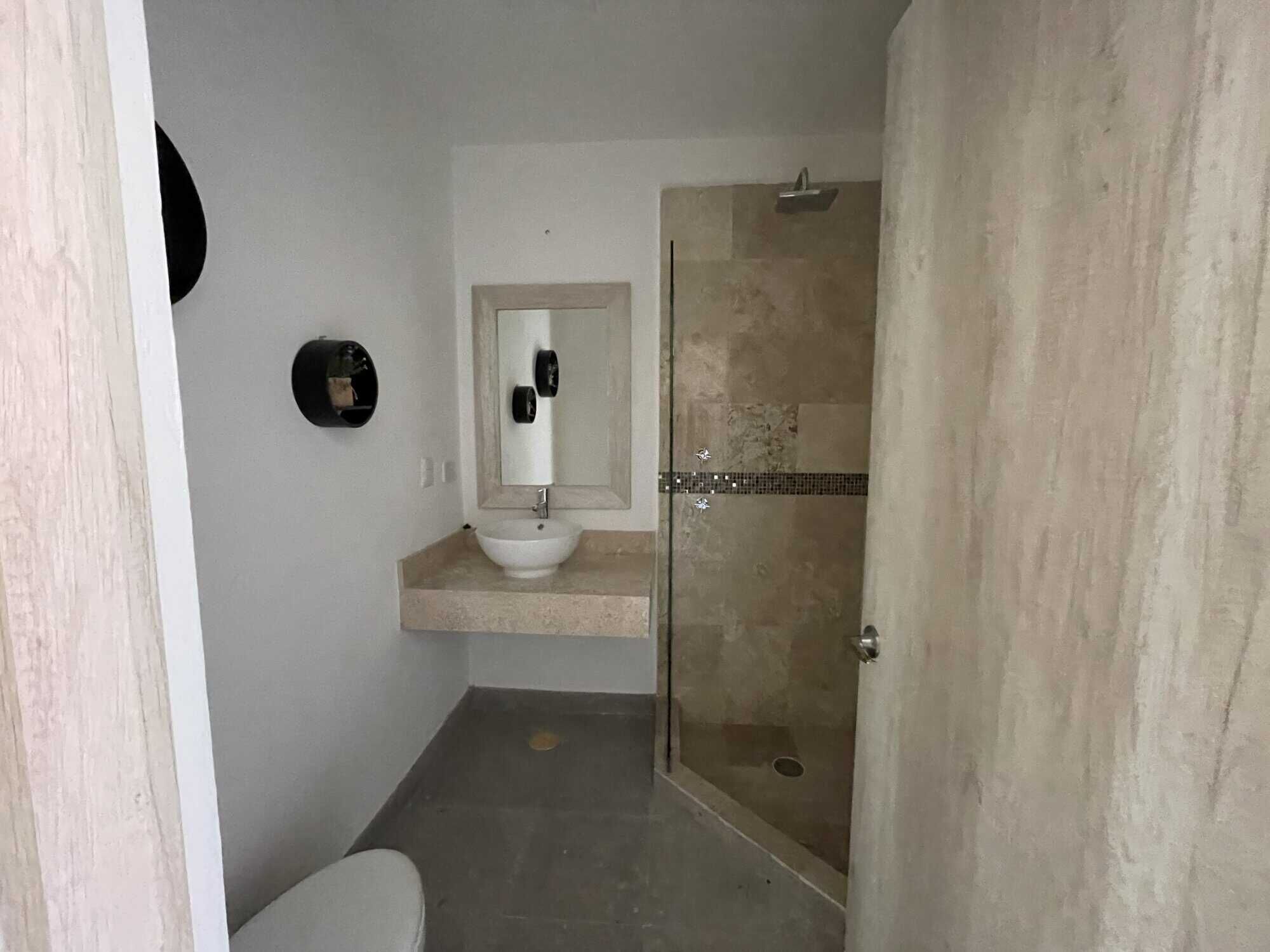 Modern colonial style bathroom with walk-in shower and minimalist design in La Serena, San Miguel de.