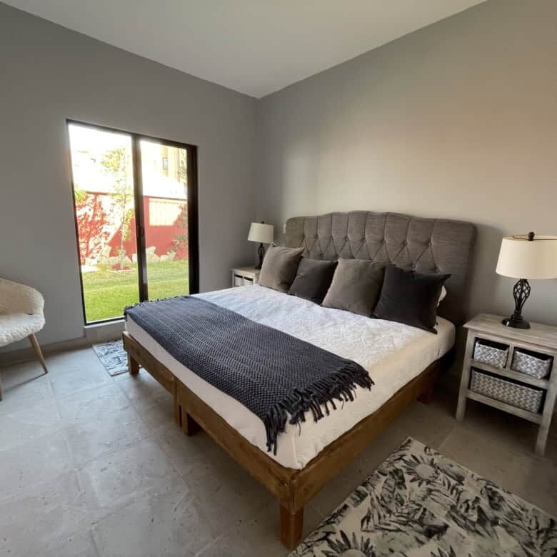 Modern colonial 3BR house bedroom with stylish decor and natural light in San Miguel de Allende.