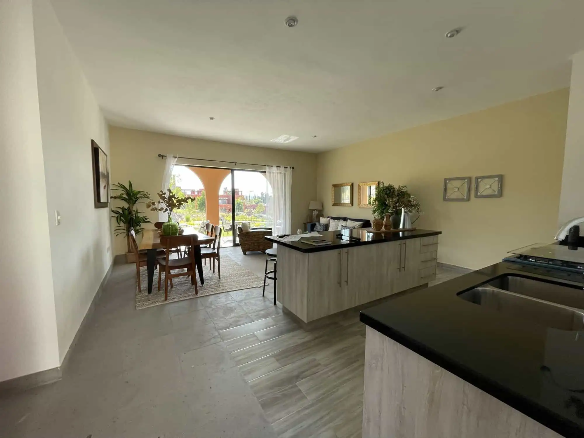 Spacious living area with open-plan kitchen and dining space in La Serena Residencial, San Miguel de.