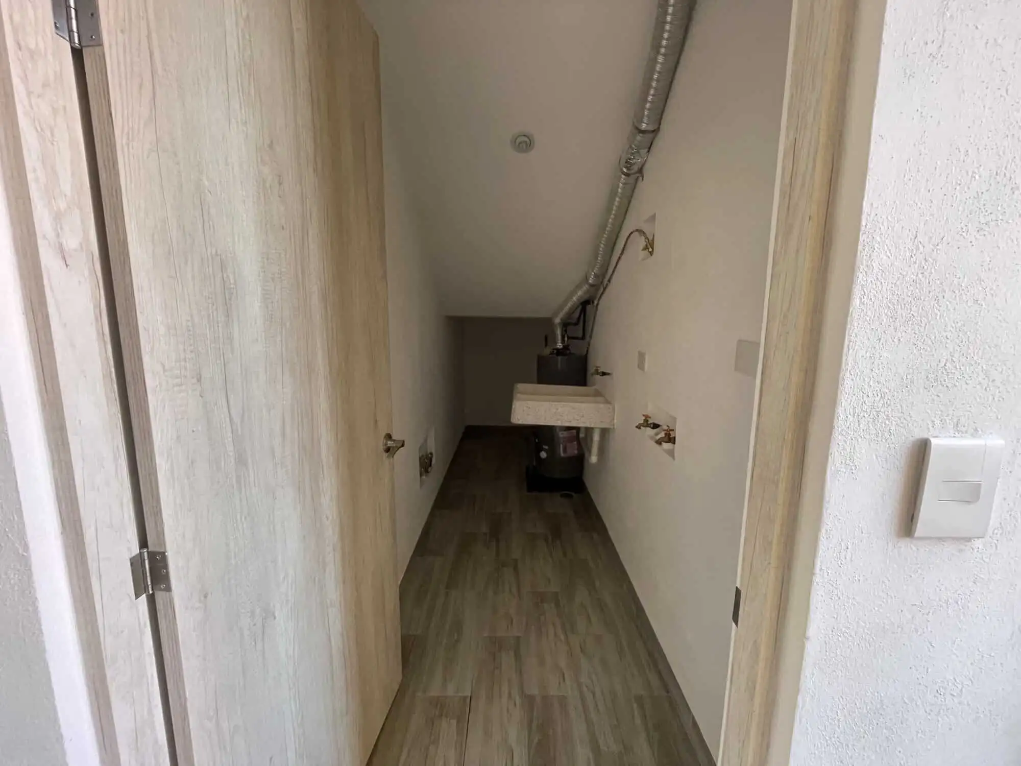 Interior view of a spacious, unfurnished room in La Serena Residencial, San Miguel de Allende, showc.
