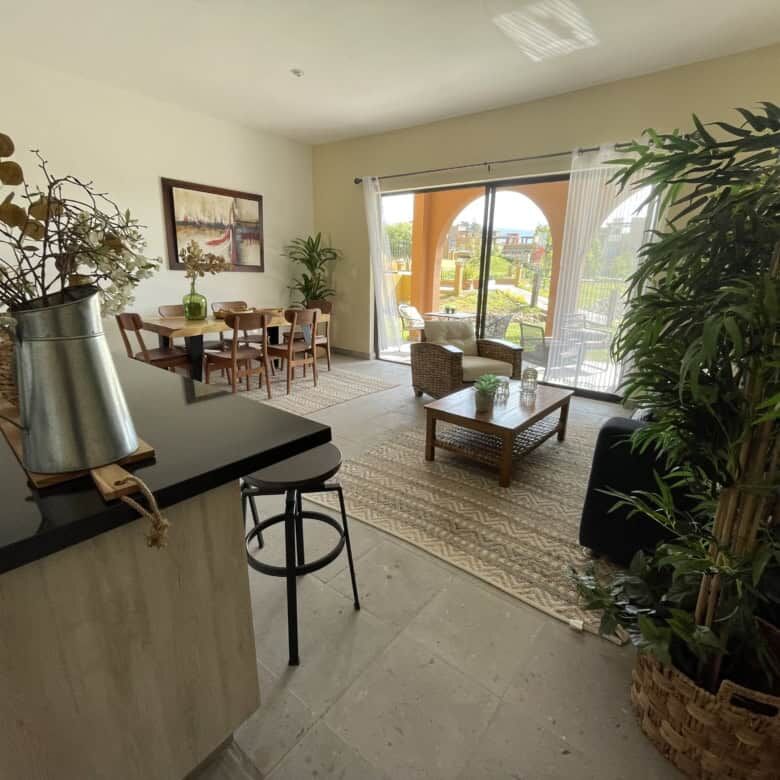 Spacious living room with large windows and natural light in La Serena Residencial.