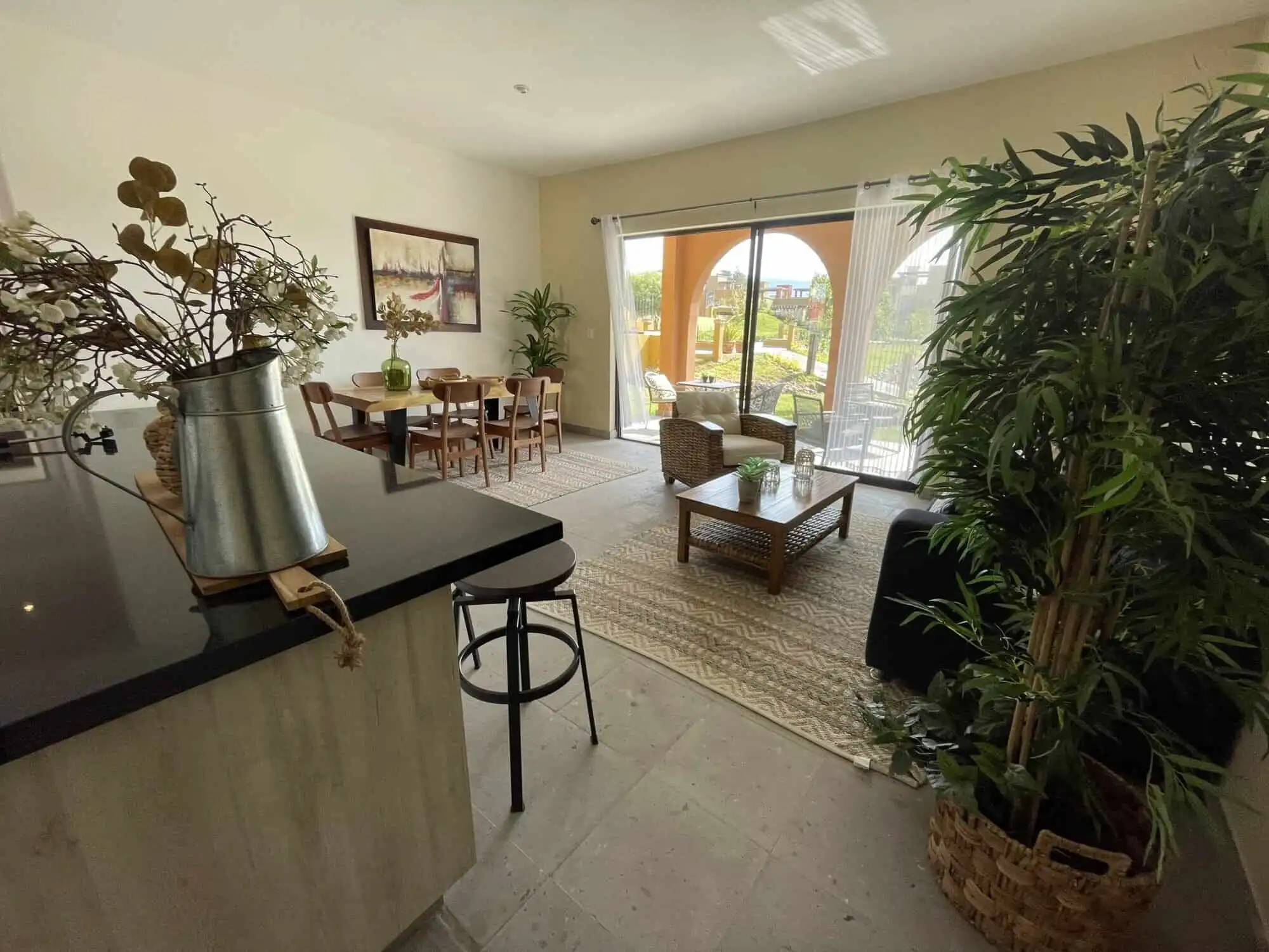 Spacious living room with large windows and natural light in La Serena Residencial.