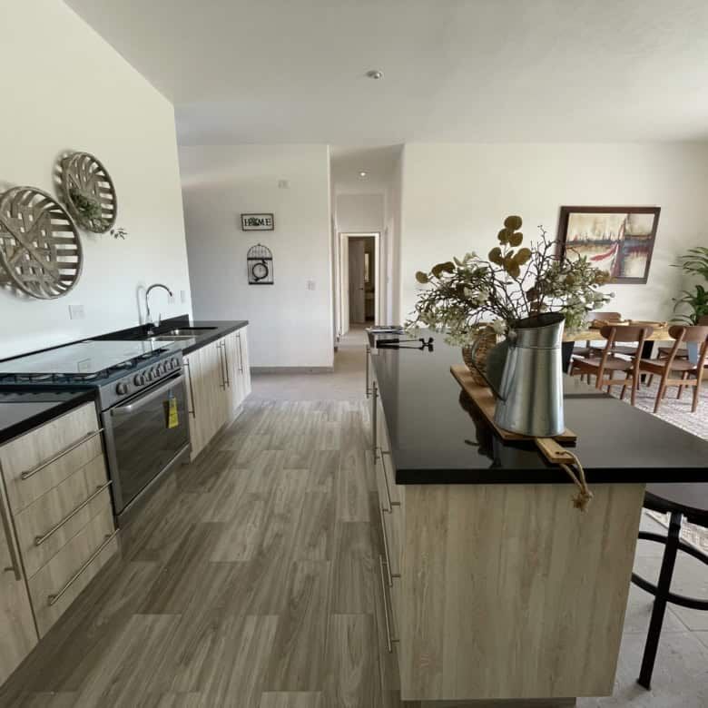 Modern kitchen and dining space in La Serena Residencial, San Miguel de Allende.