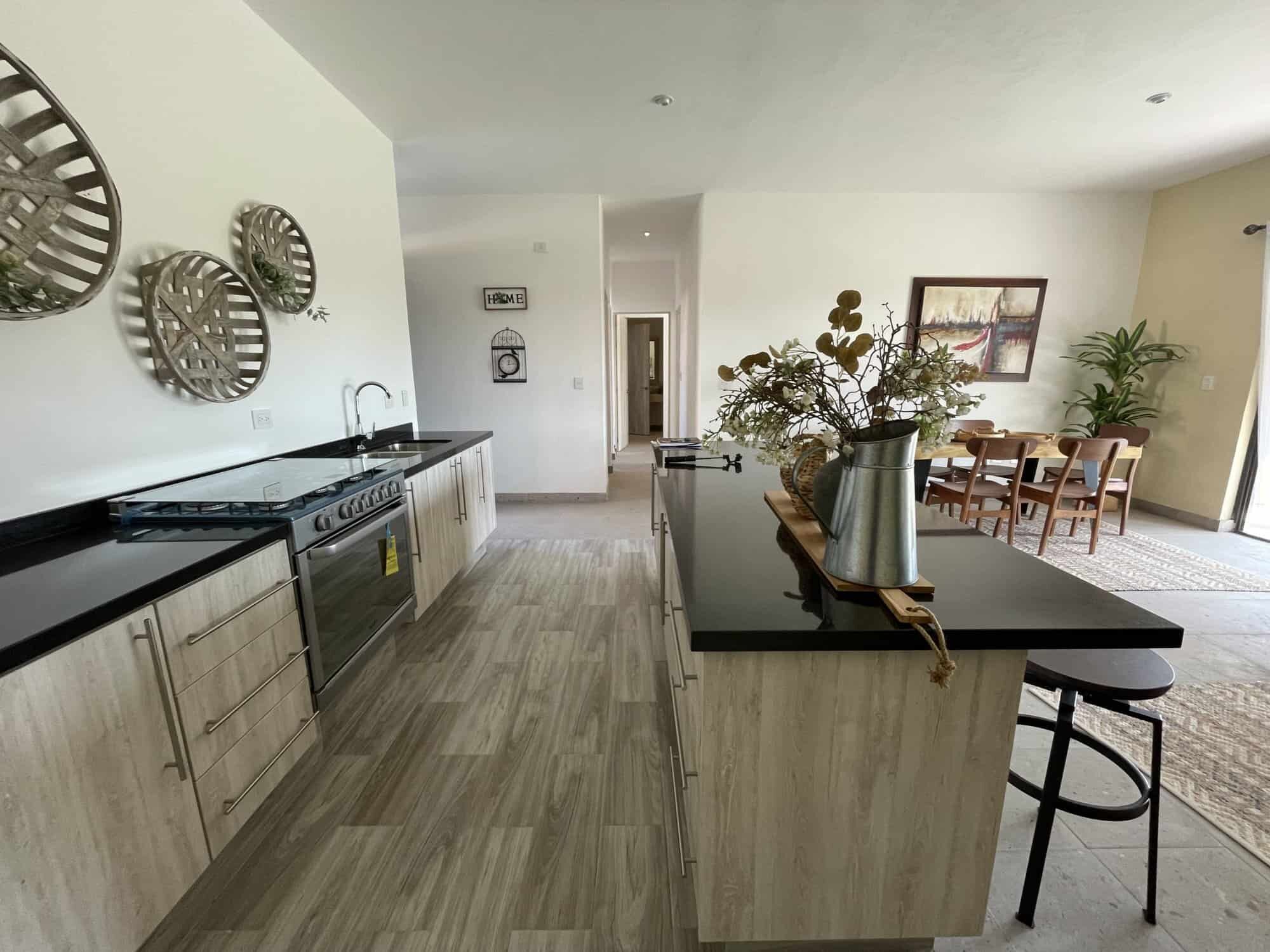 Modern kitchen and dining space in La Serena Residencial, San Miguel de Allende.
