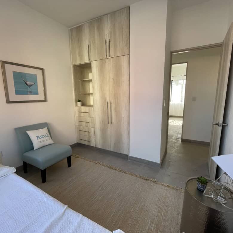 Bright bedroom with modern decor in La Serena Residencial, San Miguel de Allende. Perfect for comfor.