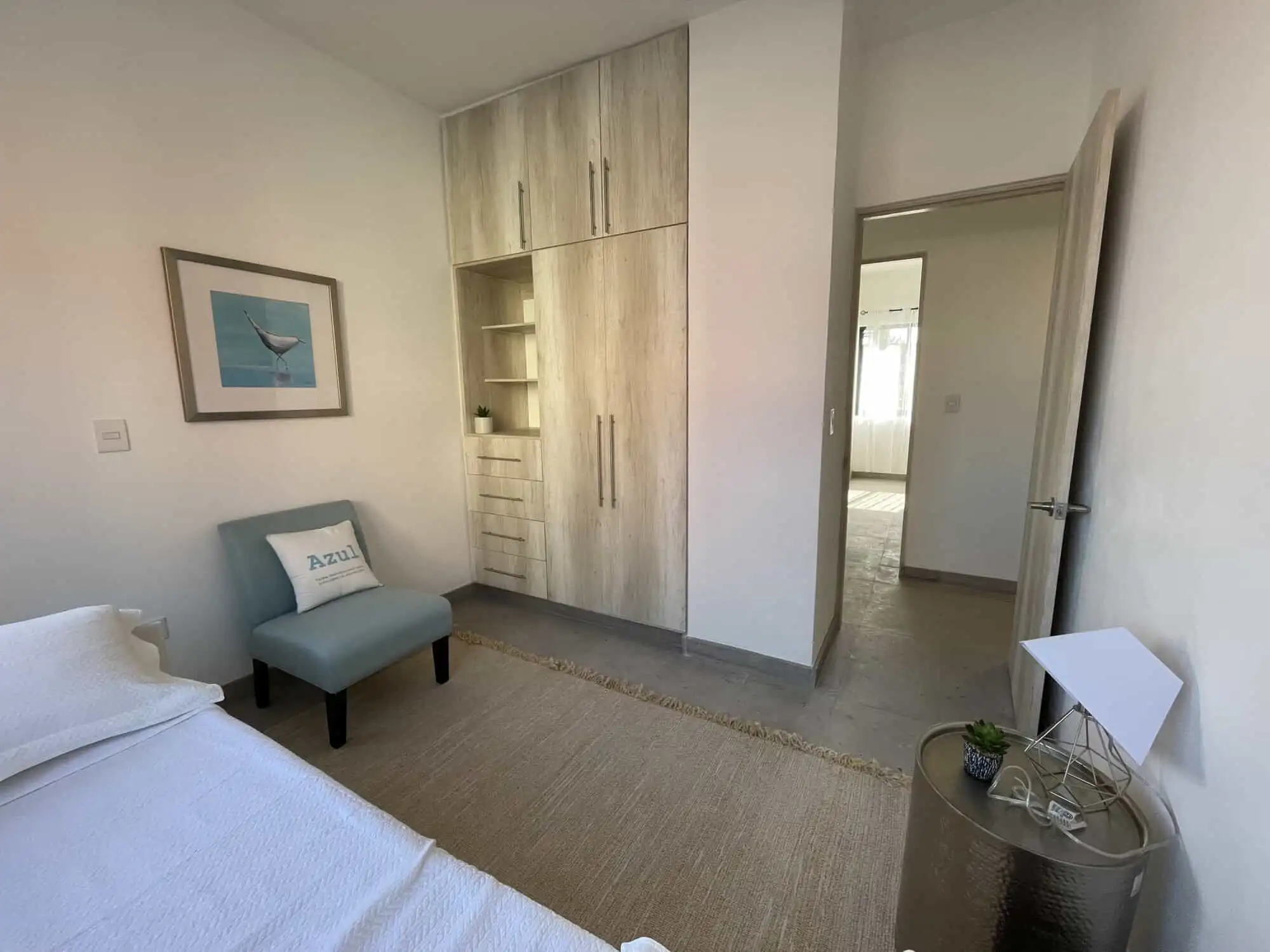 Bright bedroom with modern decor in La Serena Residencial, San Miguel de Allende. Perfect for comfor.