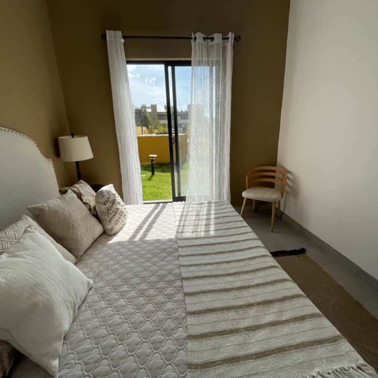 Comfortable bedroom with balcony access in La Serena Residencial.