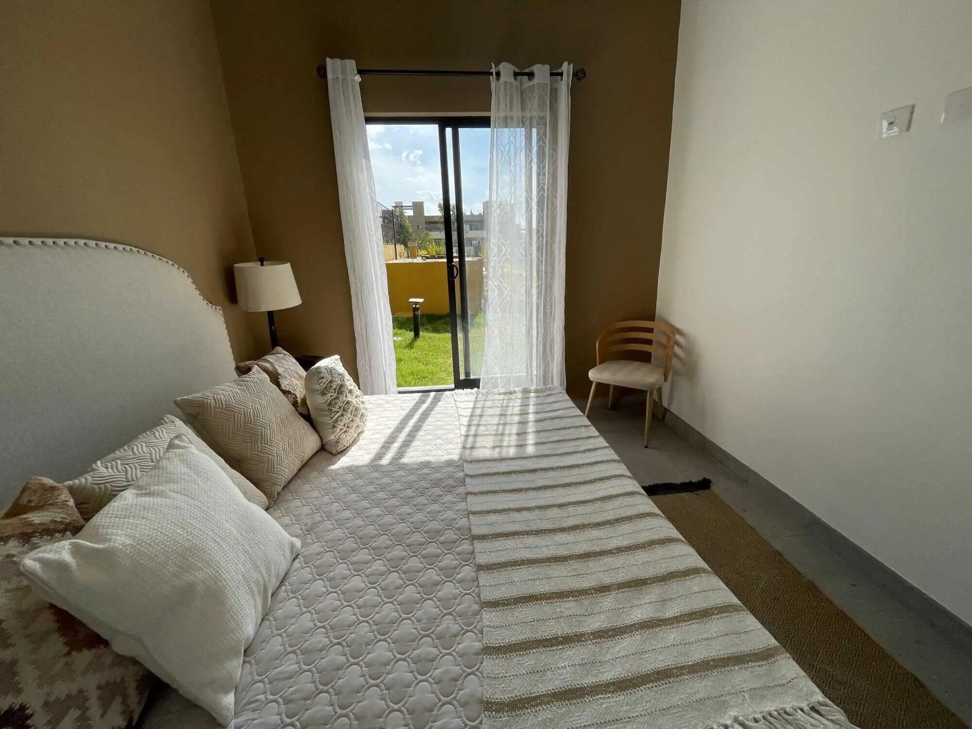 Comfortable bedroom with balcony access in La Serena Residencial.
