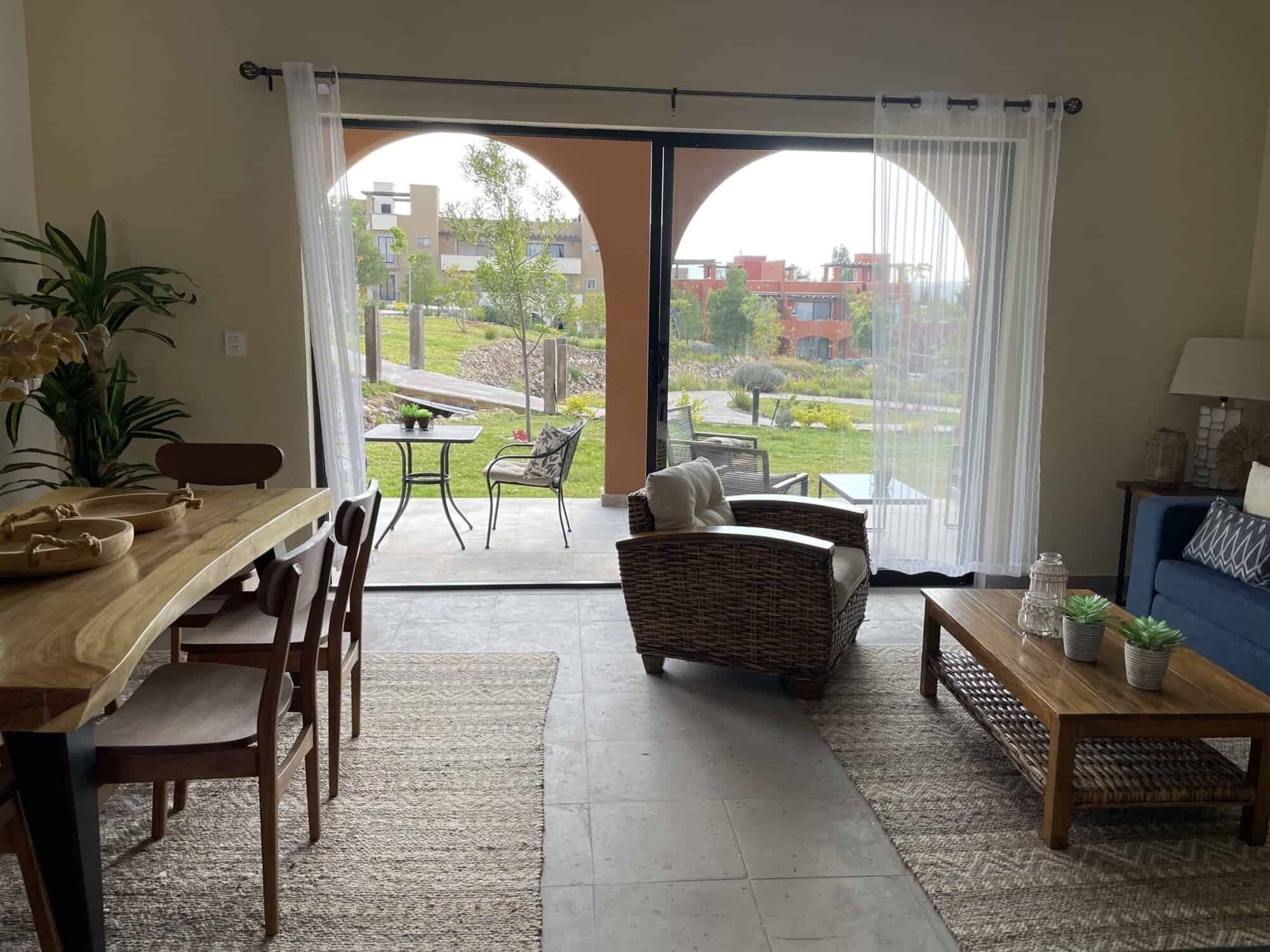 Spacious living area with comfortable seating and natural light.
