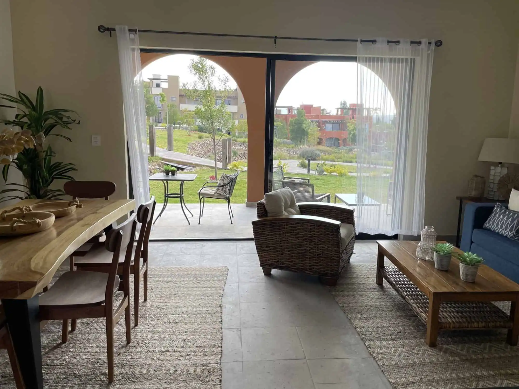 Spacious living area with comfortable seating and natural light.