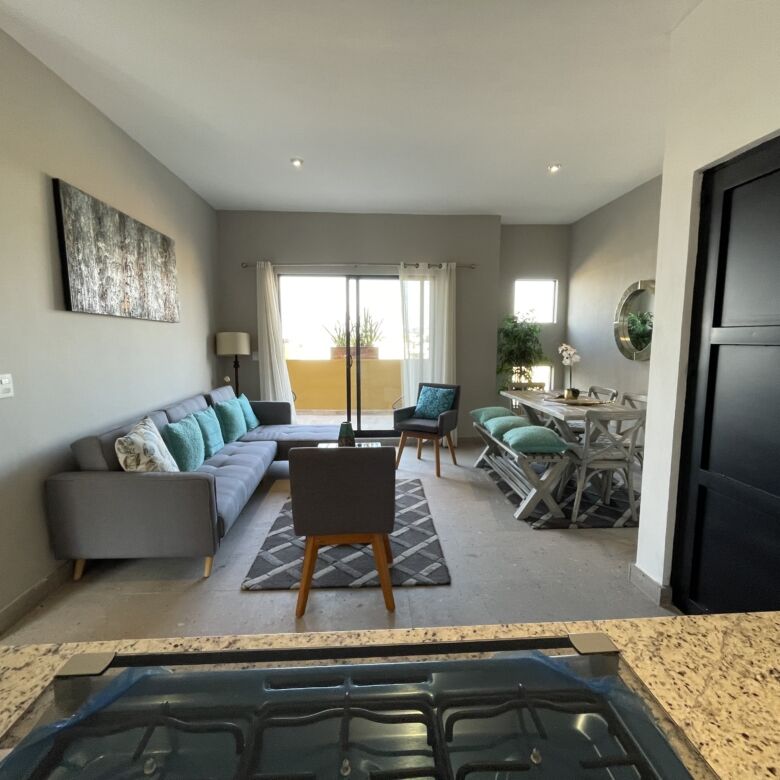 Spacious living room with contemporary furniture and natural light in San Miguel de Allende.