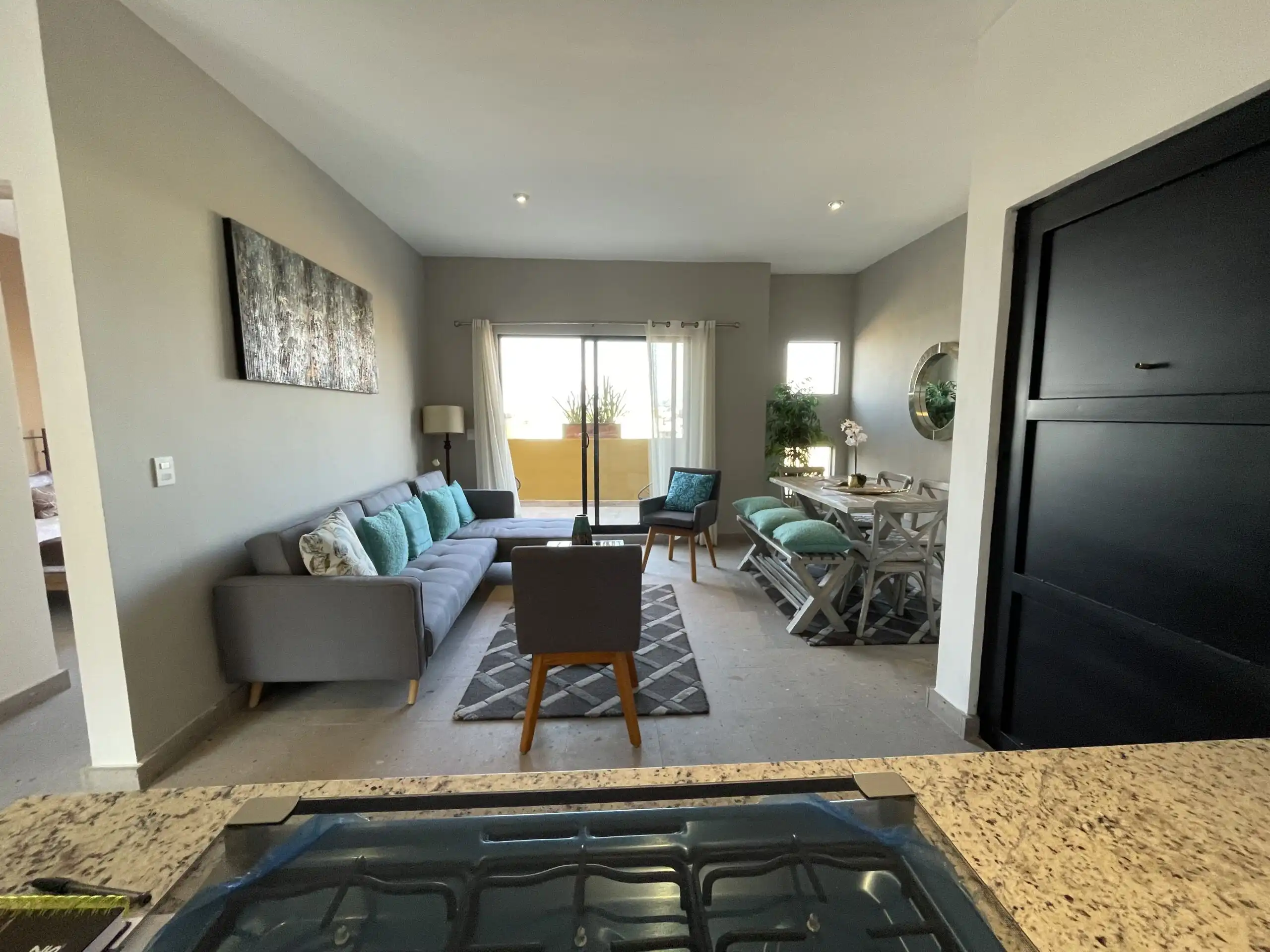 Spacious living room with contemporary furniture and natural light in San Miguel de Allende.