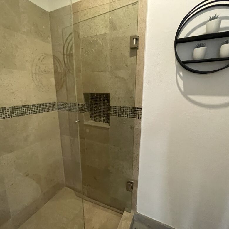 Shower area in a modern 2-bedroom apartment at La Serena Residencial, San Miguel de Allende.