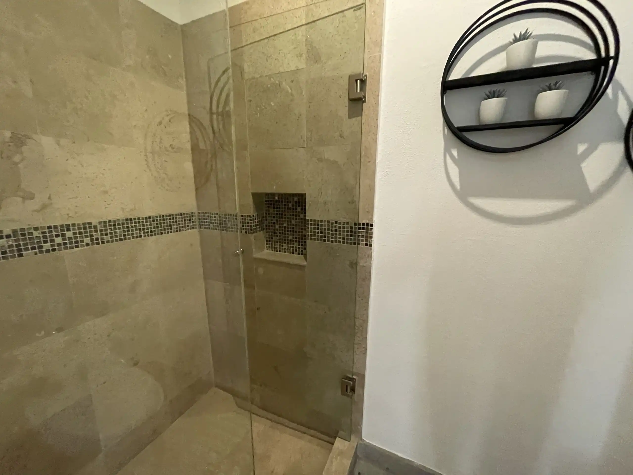 Shower area in a modern 2-bedroom apartment at La Serena Residencial, San Miguel de Allende.