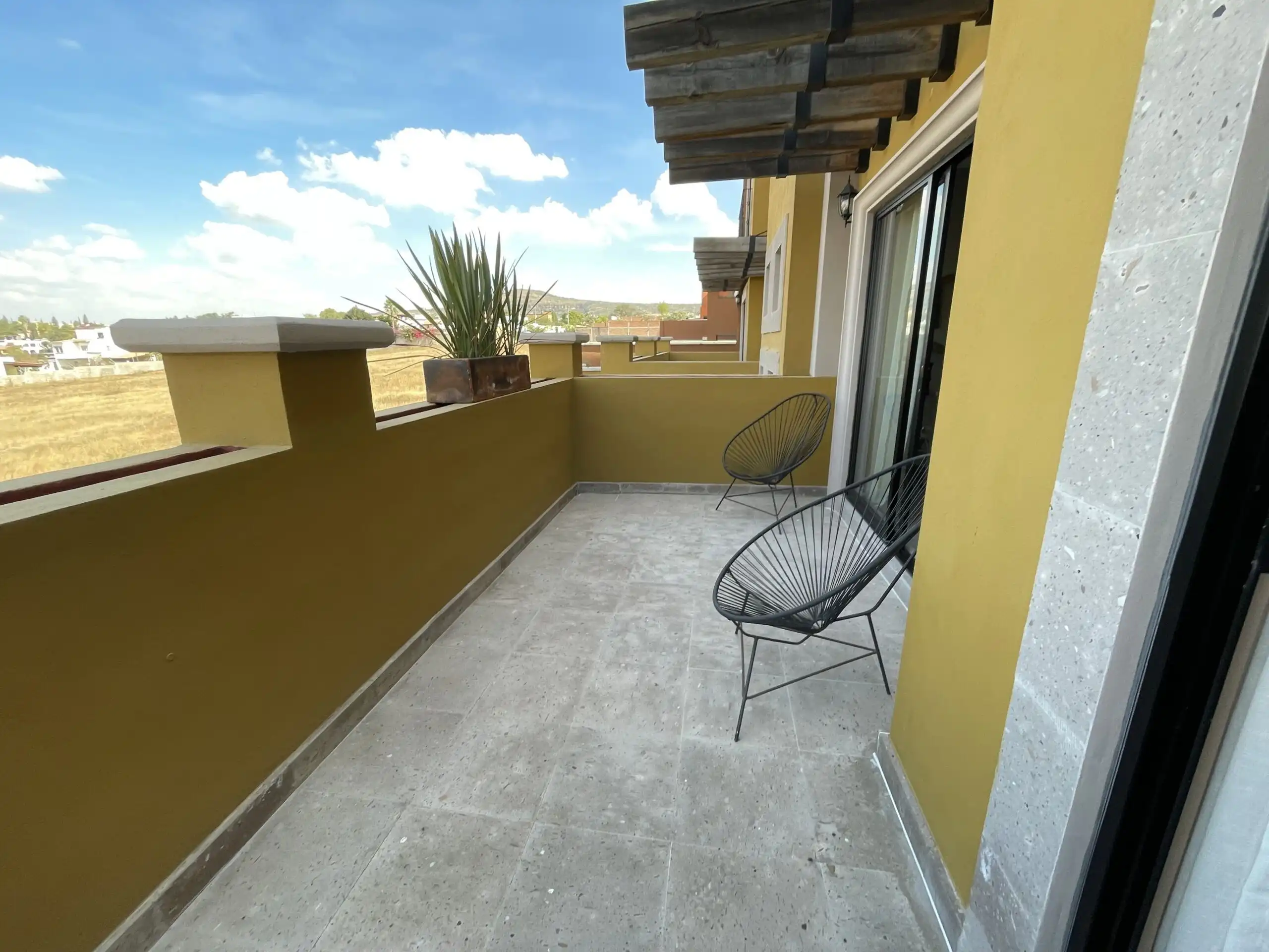 Spacious balcony of a modern 2-bedroom apartment in La Serena Residencial, San Miguel de Allende.