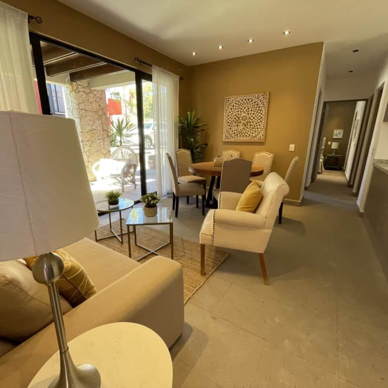 Spacious living room with natural light, stylish furniture, and access to outdoor patio. Perfect for.