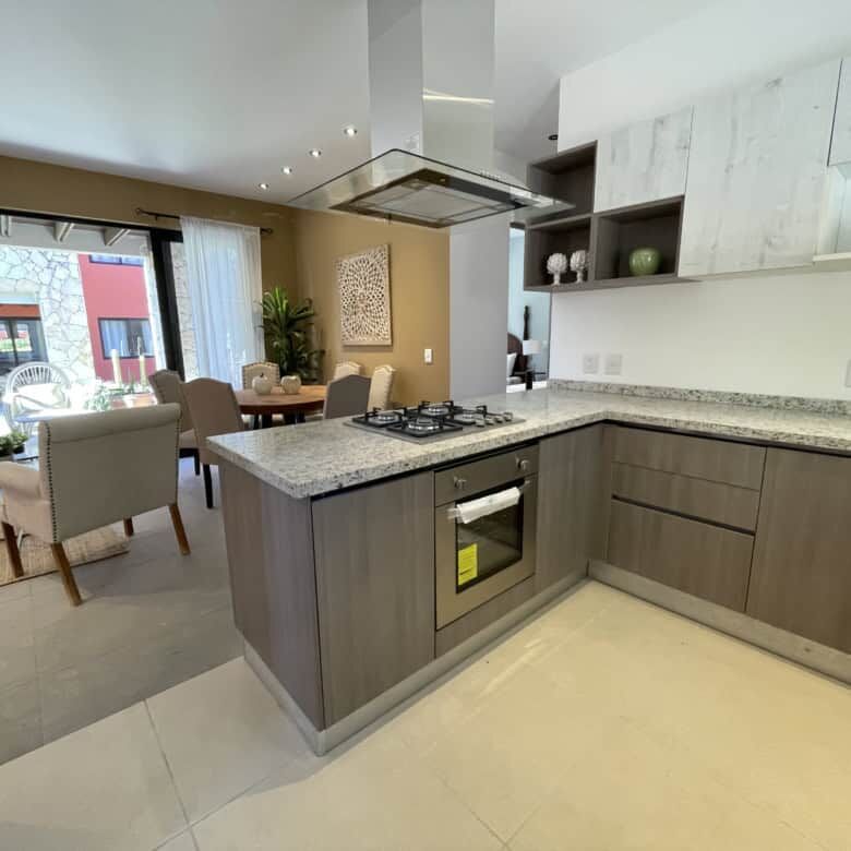 Spacious kitchen with contemporary cabinetry and granite countertops in a stylish home in San Miguel.