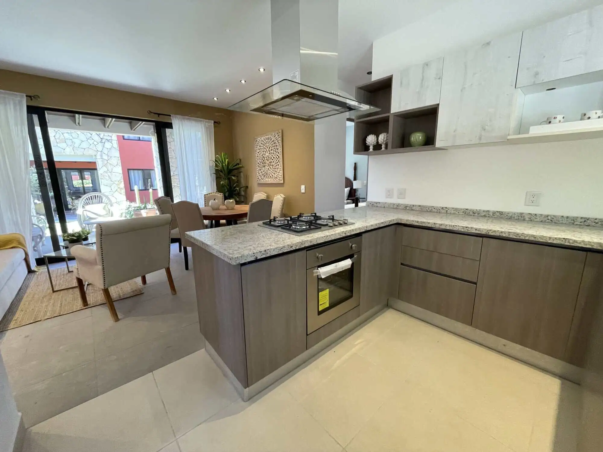 Spacious kitchen with contemporary cabinetry and granite countertops in a stylish home in San Miguel.