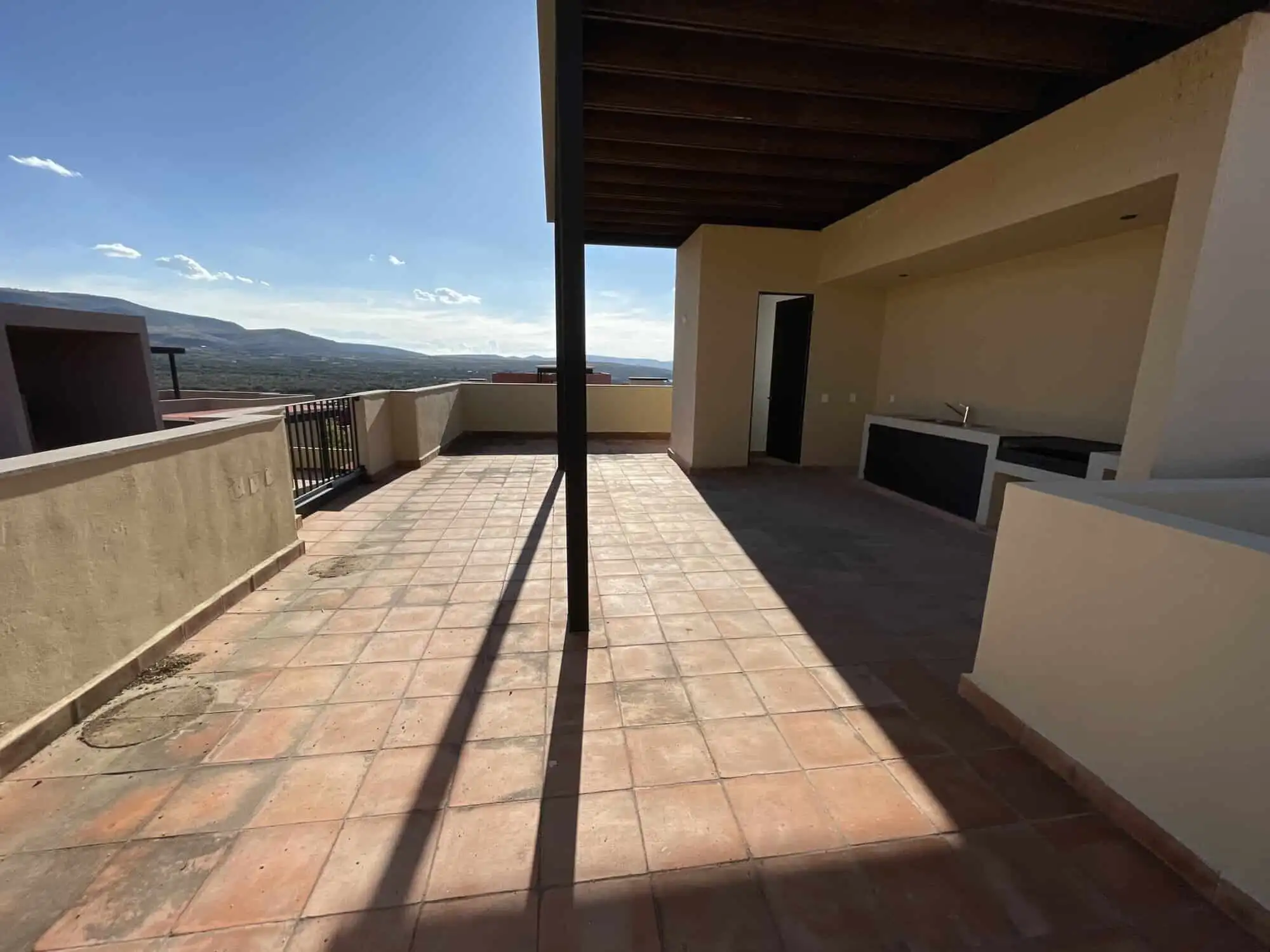 Penthouse Condo with Rooftop View Spacious penthouse condo featuring a private rooftop terrace with scenic views of San Miguel de Alle.