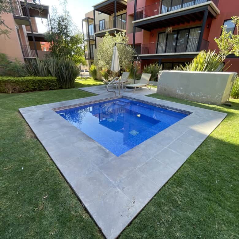 Private pool and lush garden at a penthouse condo in San Miguel de Allende.