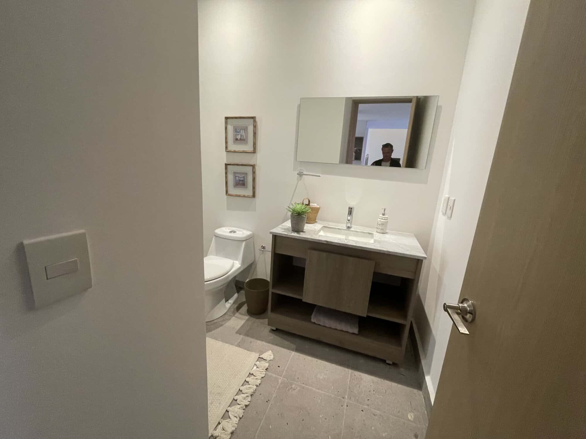 Bright bathroom with modern fixtures and decor in Punta del Cielo.