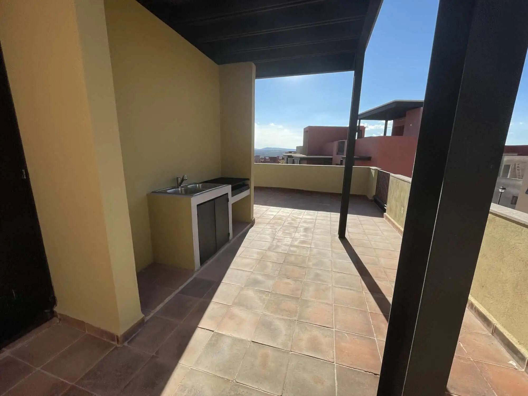 Modern rooftop terrace with outdoor kitchen in San Miguel de Allende. Rooftop terrace with outdoor kitchen and city views in San Miguel de Allende.