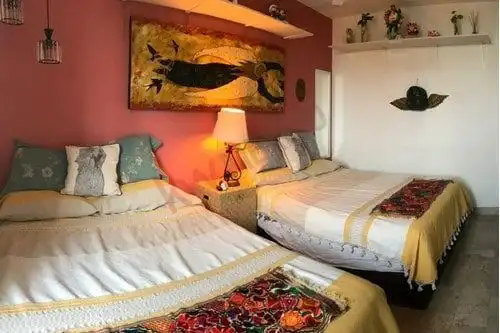 Floor condo for sale in La Luminaria, San Miguel de Allende, featuring comfortable bedrooms and char.