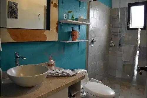 Floor condo bathroom with modern fixtures in La Luminaria, San Miguel de Allende. Perfect for comfor.
