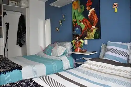 Bright bedroom with colorful decor in a luxury ground-floor condo in San Miguel de Allende. Perfect.