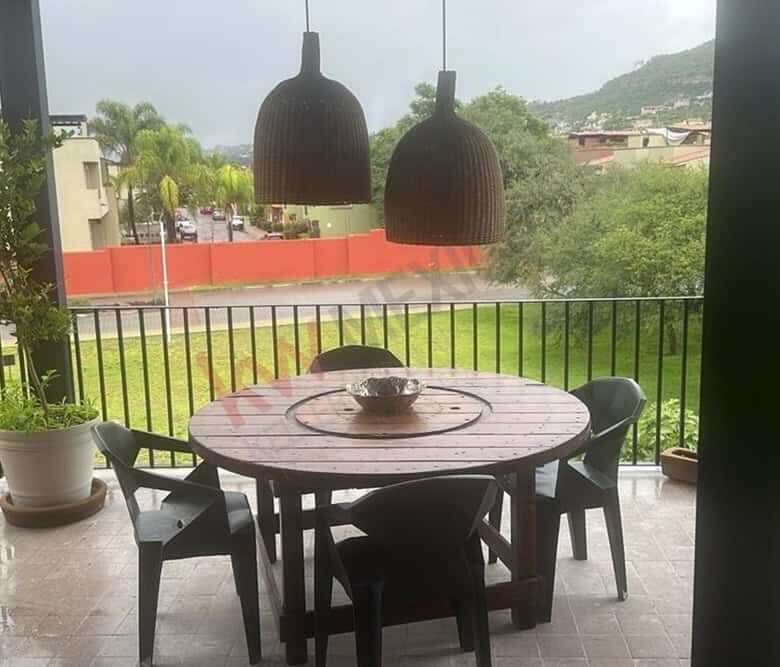 Balcony with outdoor dining table and mountain views in San Miguel de Allende. Perfect for relaxing.