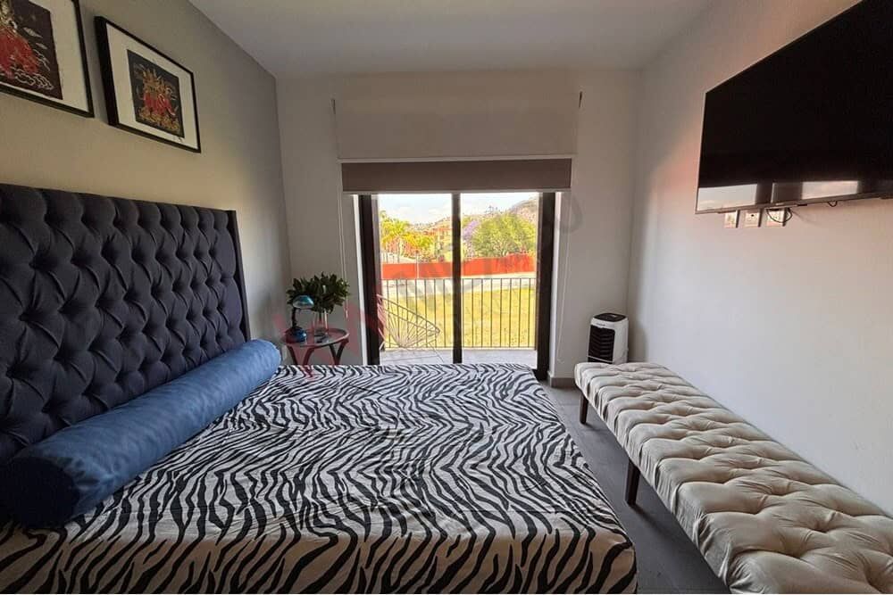 Penthouse Bedroom with Mountain Views Bright bedroom with mountain views in Punta de Cielo, San Miguel de Allende. Modern decor and spacio.