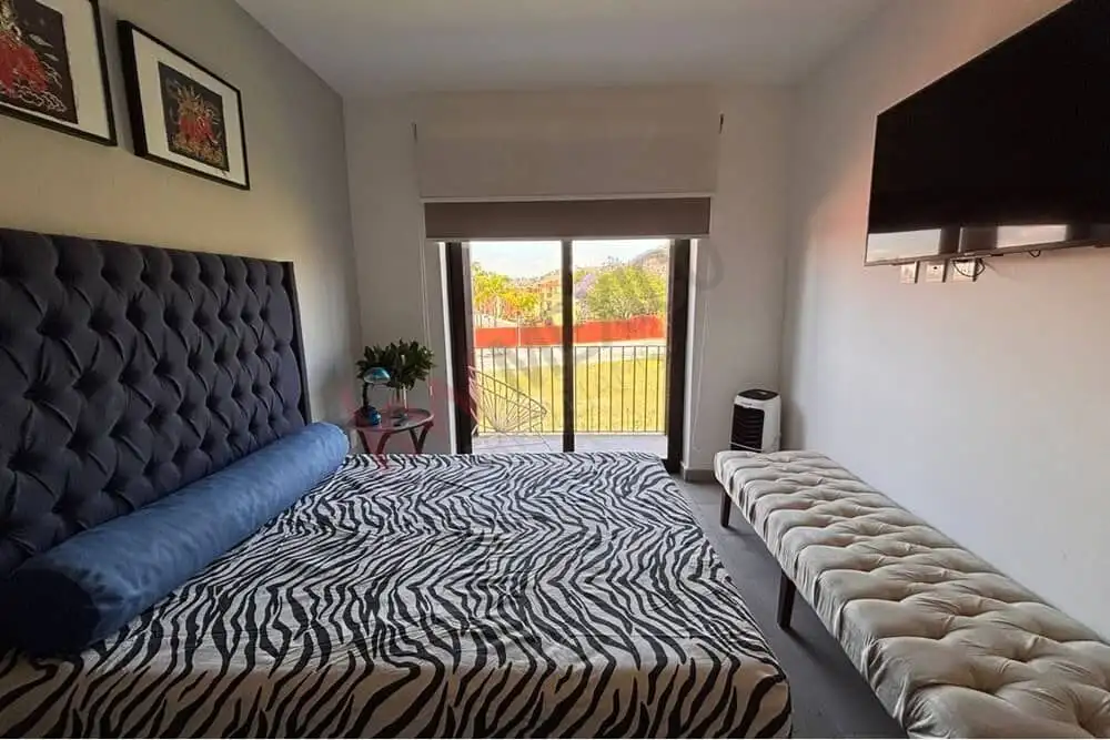 Bright bedroom with mountain views in Punta de Cielo, San Miguel de Allende. Modern decor and spacio.