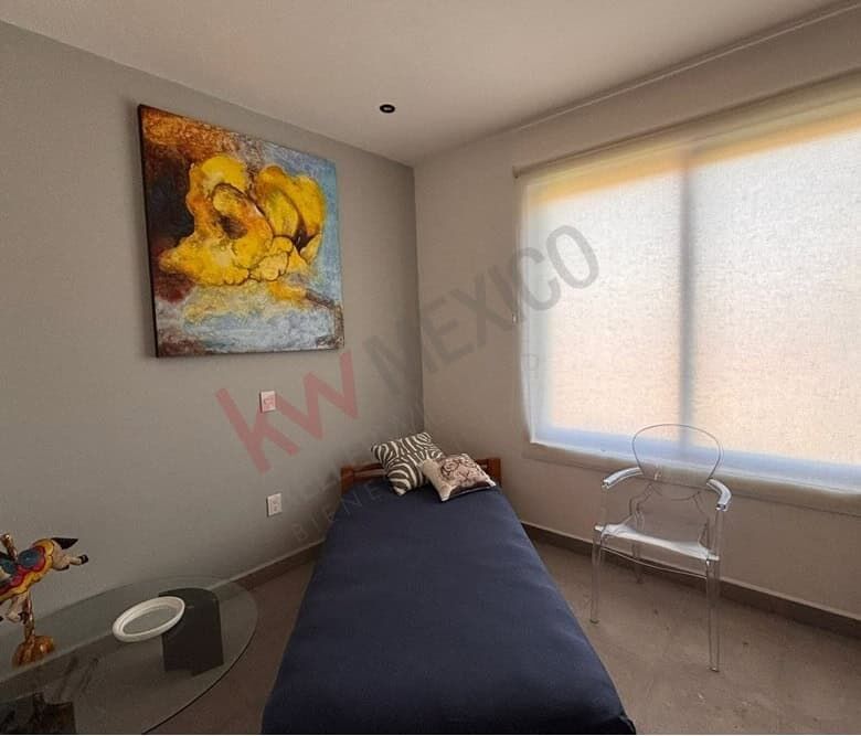 Modern bedroom with mountain views in Punta de Cielo, San Miguel de Allende.