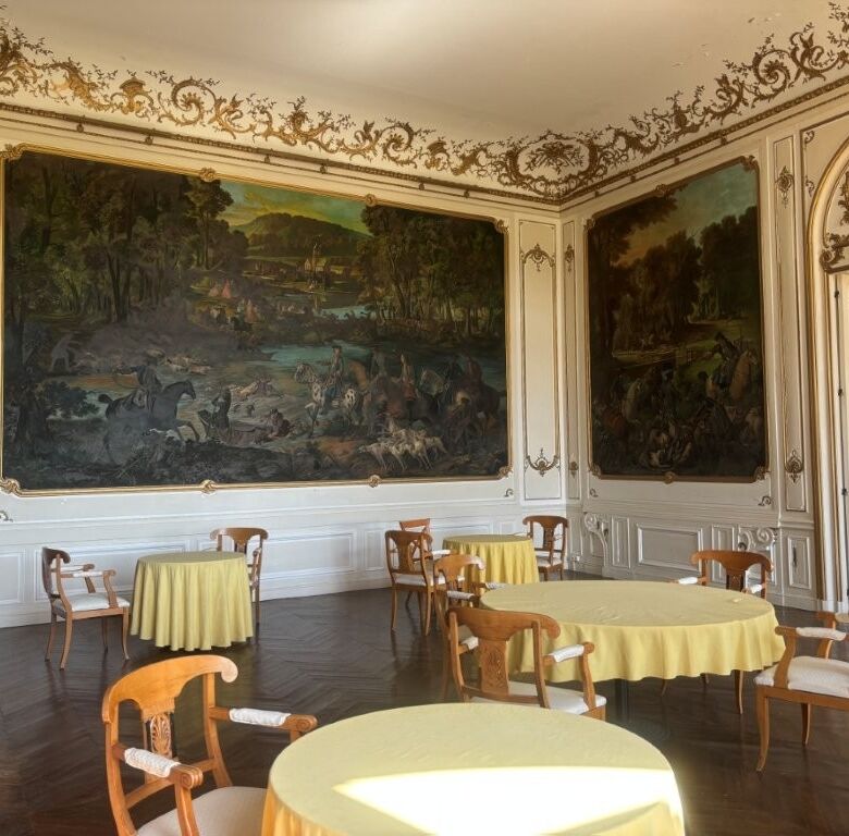 Elegant Château du Francport apartment interior in Choisy-au-Bac with classic decor and artwork.