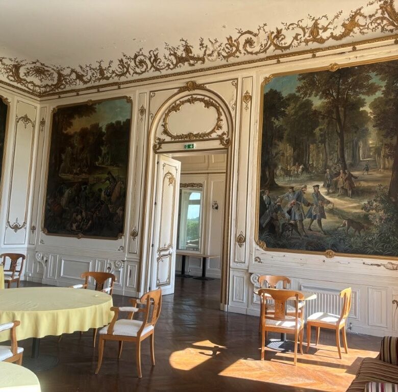 Elegant interior of Château du Francport apartments in Choisy-au-Bac, featuring classic decor and la.