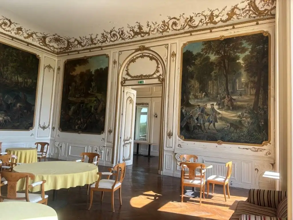 Elegant interior of Château du Francport apartments in Choisy-au-Bac, featuring classic decor and la.