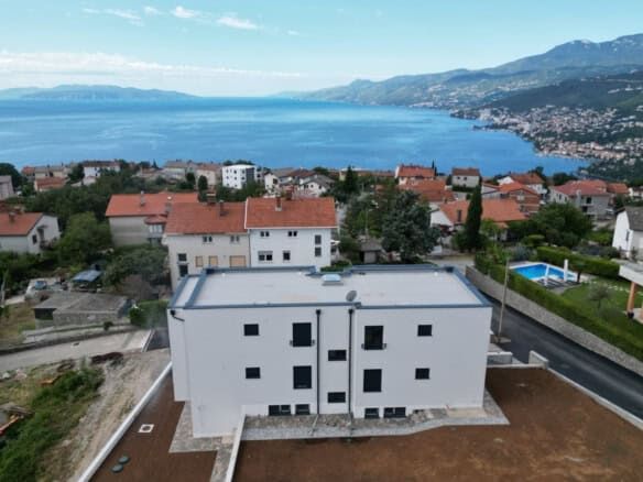 Modern duplex apartment with private garden in Kastav overlooking Croatia’s Kvarner Bay.”