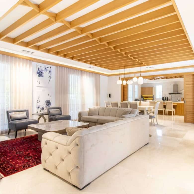 Spacious living room of a luxury 4-bedroom villa in Kyrenia North, featuring modern decor and open-p.