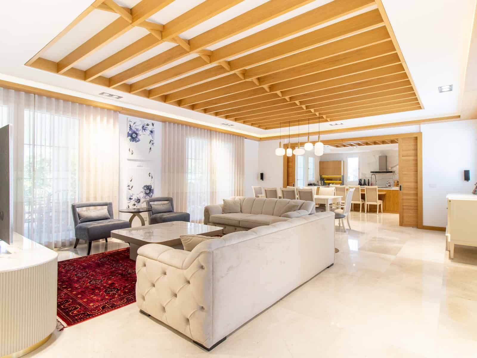 Luxury 4 Bed Villa in Kyrenia North Spacious living room of a luxury 4-bedroom villa in Kyrenia North, featuring modern decor and open-p.