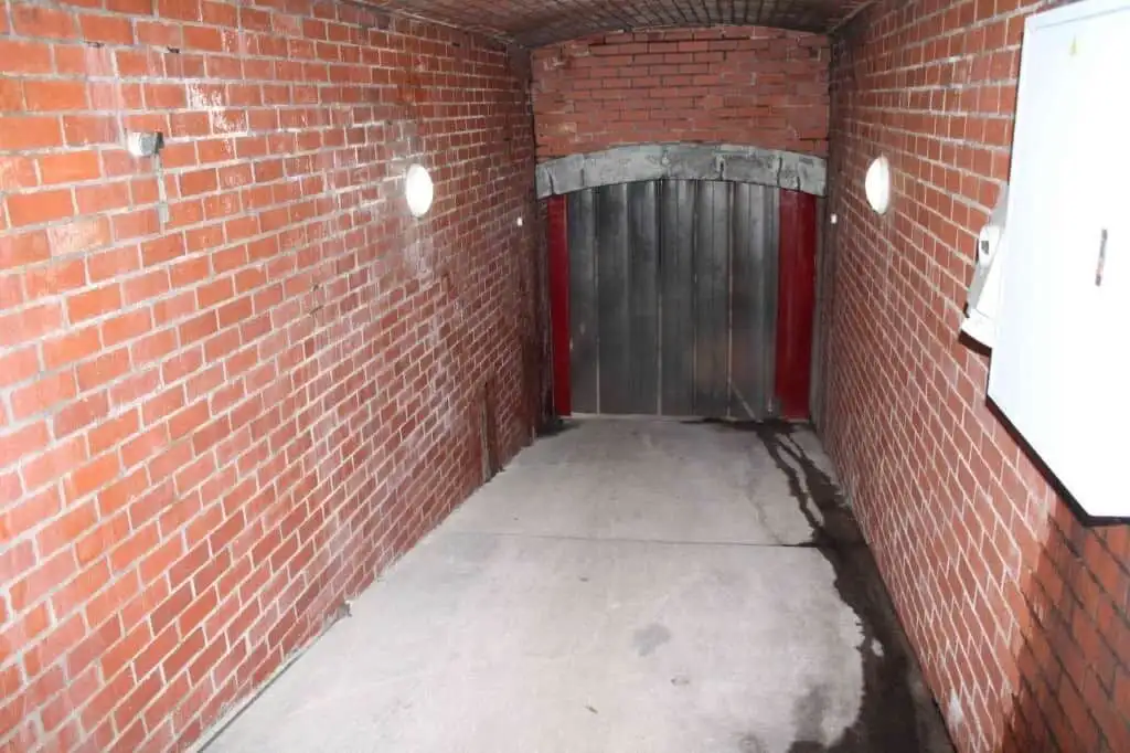 Wine & Olive Estate cellar entrance with brick walls in Wellington, Western Cape, South Africa.