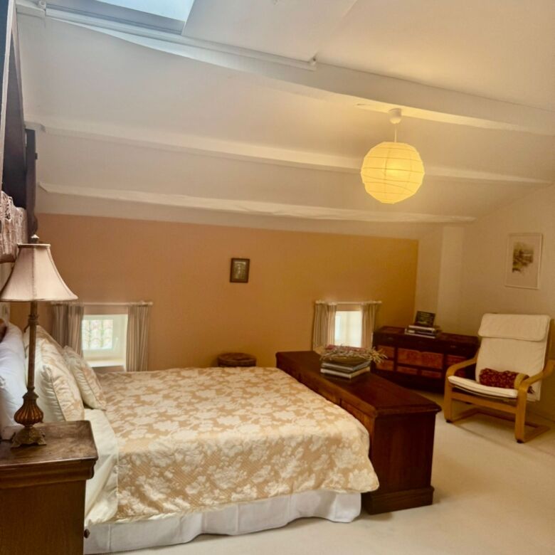 Bright interior of a luxury 4-bedroom townhouse in Allemans-du-dropt, featuring a comfortable bed an.