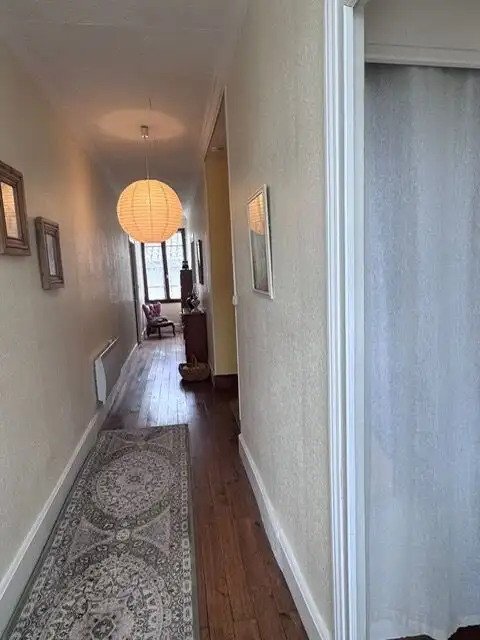 Bright hallway with elegant decor in a luxury townhouse in Lot et Garonne.