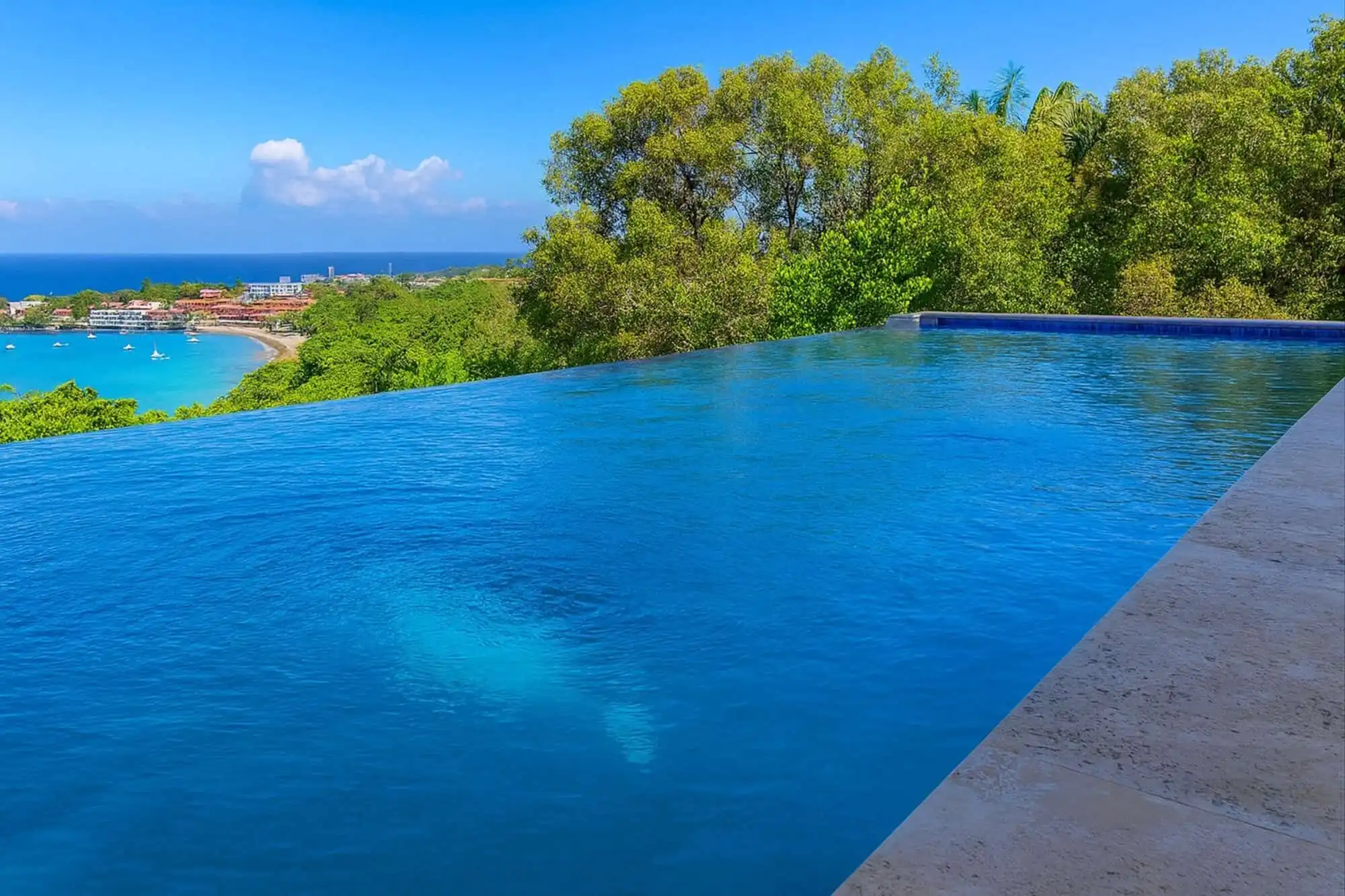 Luxury pool with ocean view at Sosua estate, Dominican Republic.