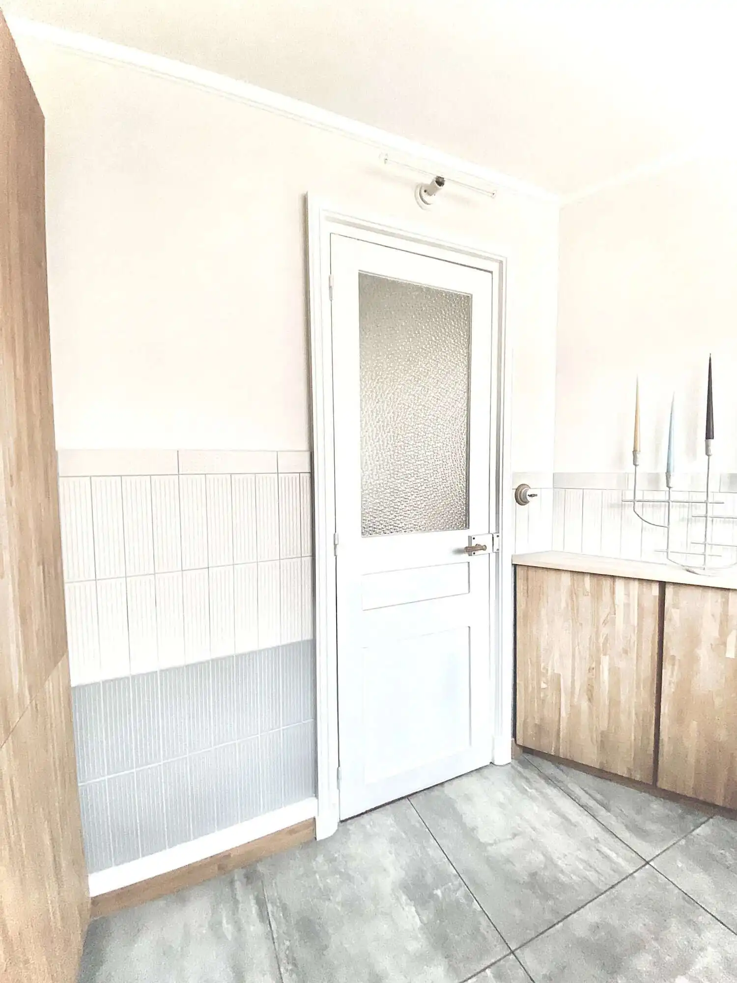 Bright interior door in a stylish apartment in Paris.