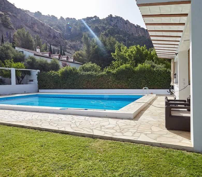 Elegant outdoor pool area at a spacious 7-bedroom estate in La Cerradura, Jaen. Perfect for relaxing.