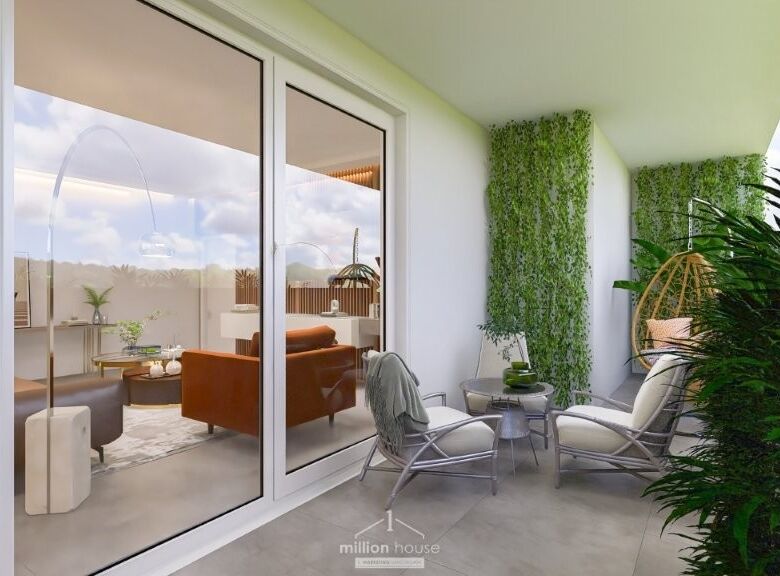 Stylish balcony with green wall and outdoor furniture in Seregno Lombardy.